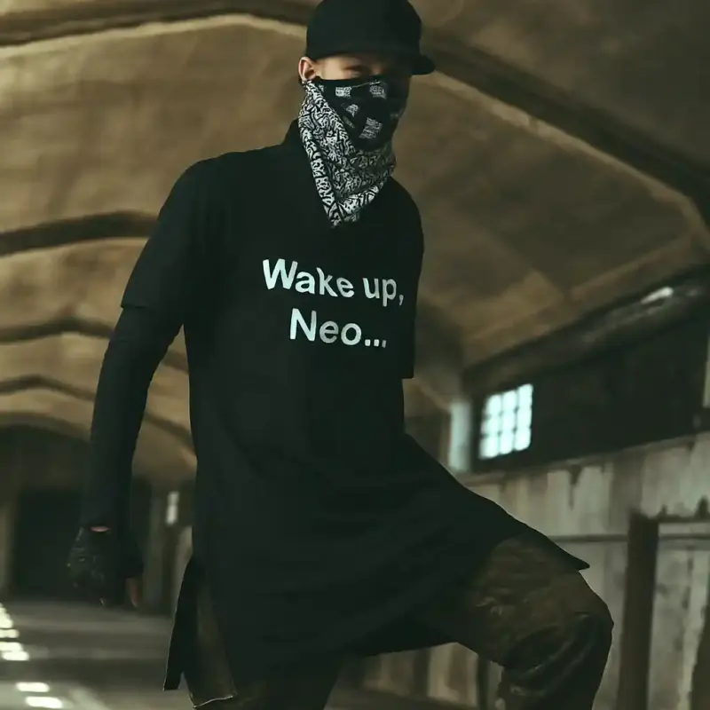 Man wearing a black t-shirt with the phrase 'Wake up, Neo...' – NEO-inspired crypto streetwear design