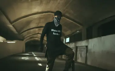 Man wearing a black t-shirt with the phrase 'Wake up, Neo...' – NEO-inspired crypto streetwear design
