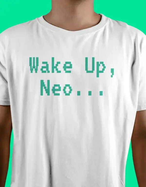 White t-shirt with green pixel text "Wake Up, Neo..." – crypto and Matrix inspired design.